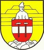 Das Eisenerzer Wappen mit Bergmann der ein Schild hält