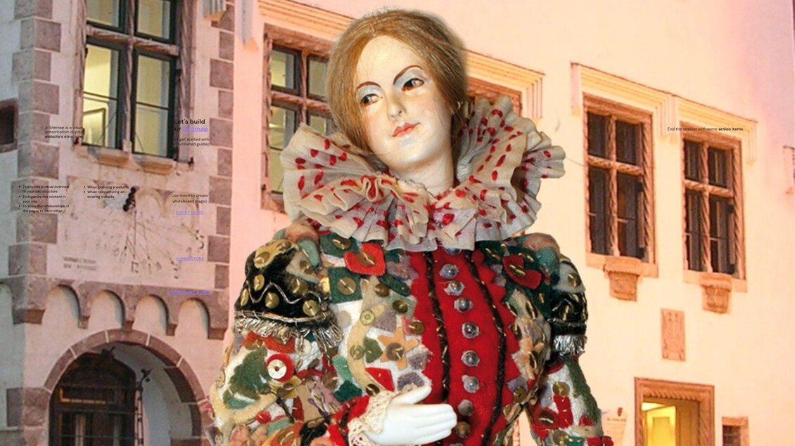 Die prachtvolle Figur eines geschmückten Ausseer Flinserls, einer der Hauptakteure im traditionellen Ausseer Fasching, steht vor dem historischen Gebäude des Kammerhofmuseums in Bad Aussee. | © Kammerhofmuseum, Bad Aussee