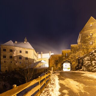 Gate to Rabenstein Castle in winter | © Region Graz-Harry Schiffer