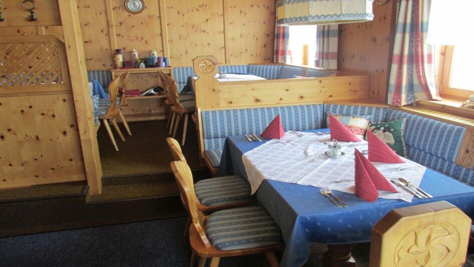 Alpen Arnika, Tauplitzalm, gedeckter Tisch | © Hotel Alpen Arnika
