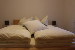 Weingartenhaus Teltscher Zimmer gemütliches Bett